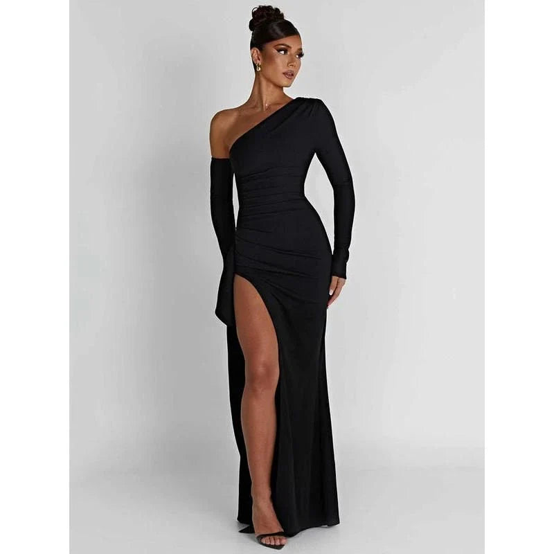 Elegant wine red maxi dress with oblique shoulder design, thigh-high split, and backless feature for sophisticated evening wear