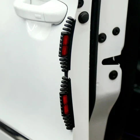 Reflective car door guards with ridged texture, providing protection against dings and dents