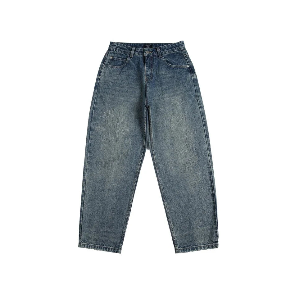 Autumn New Retro Loose Jeans in dark blue, featuring a tapered leg design and unique printing techniques for a vintage-inspired look.