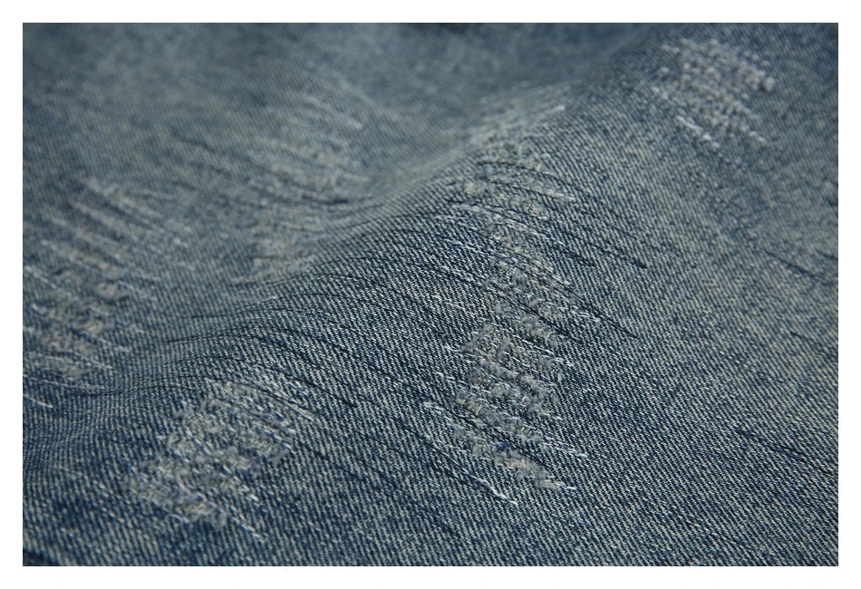 Autumn New Retro Loose Jeans in dark blue, featuring a tapered leg design and unique printing techniques for a vintage-inspired look.