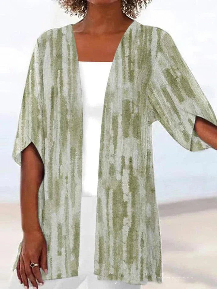 Printed Loose Top Fashion Coat in various vibrant colours, featuring a V-shaped collar and 5/4 sleeves for a modern, stylish look.
