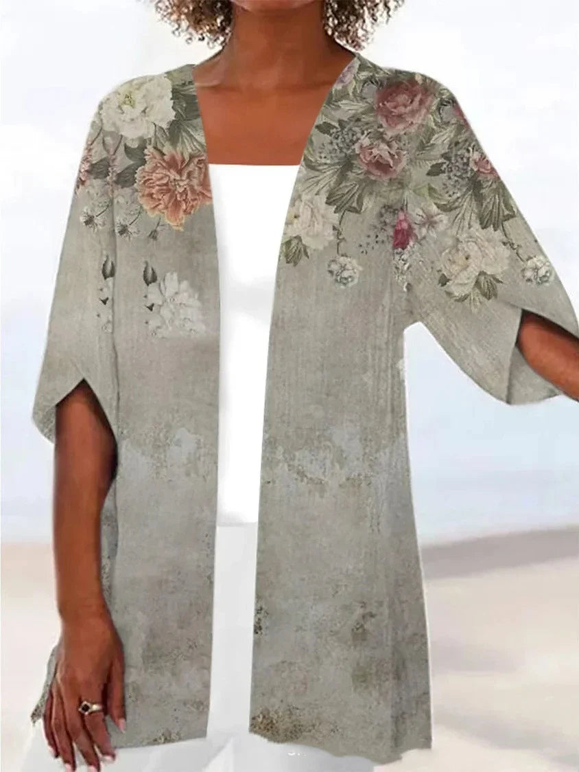 Printed Loose Top Fashion Coat in various vibrant colours, featuring a V-shaped collar and 5/4 sleeves for a modern, stylish look.