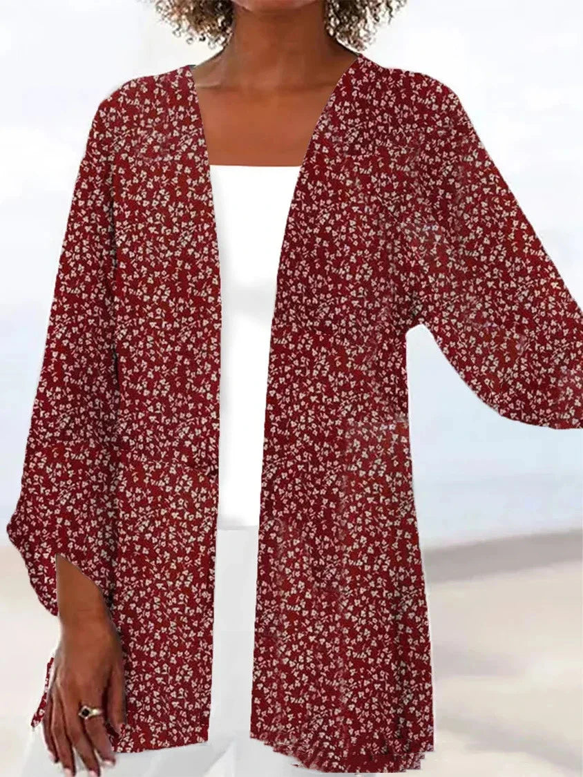 Printed Loose Top Fashion Coat in various vibrant colours, featuring a V-shaped collar and 5/4 sleeves for a modern, stylish look.