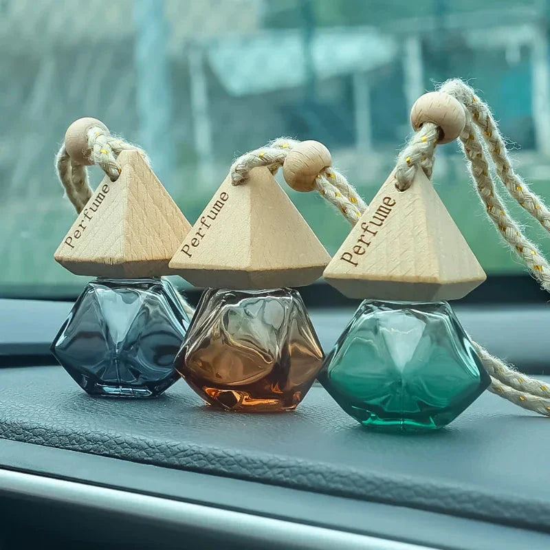 Essential Oil Diffuser Car Pendant - A sophisticated glass hanging perfume bottle that adds elegance and freshness to your car, home, or office