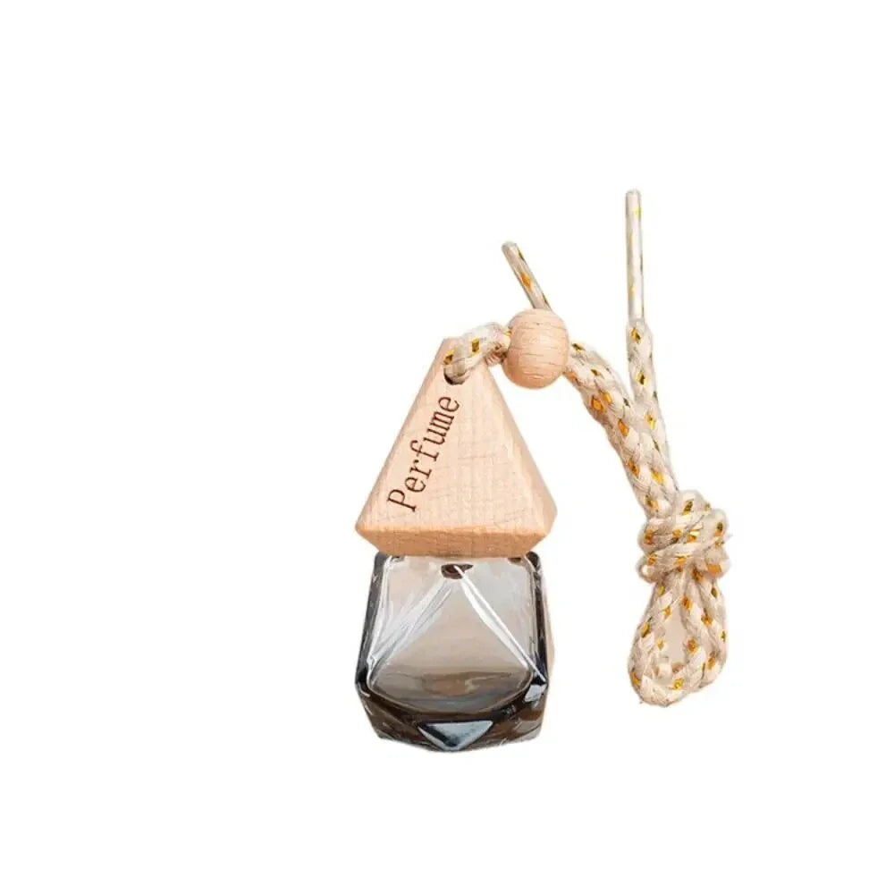 Essential Oil Diffuser Car Pendant - A sophisticated glass hanging perfume bottle that adds elegance and freshness to your car, home, or office