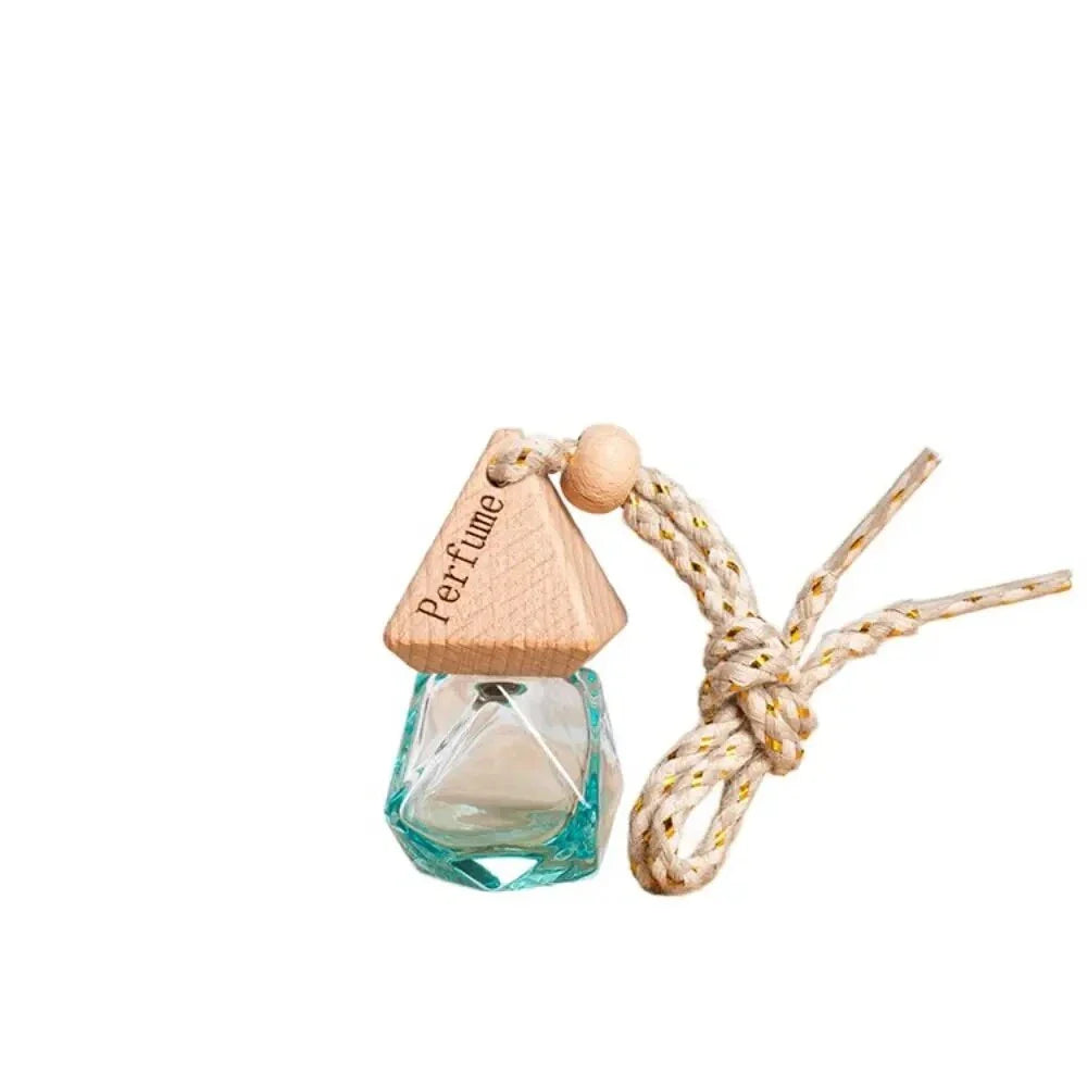 Essential Oil Diffuser Car Pendant - A sophisticated glass hanging perfume bottle that adds elegance and freshness to your car, home, or office