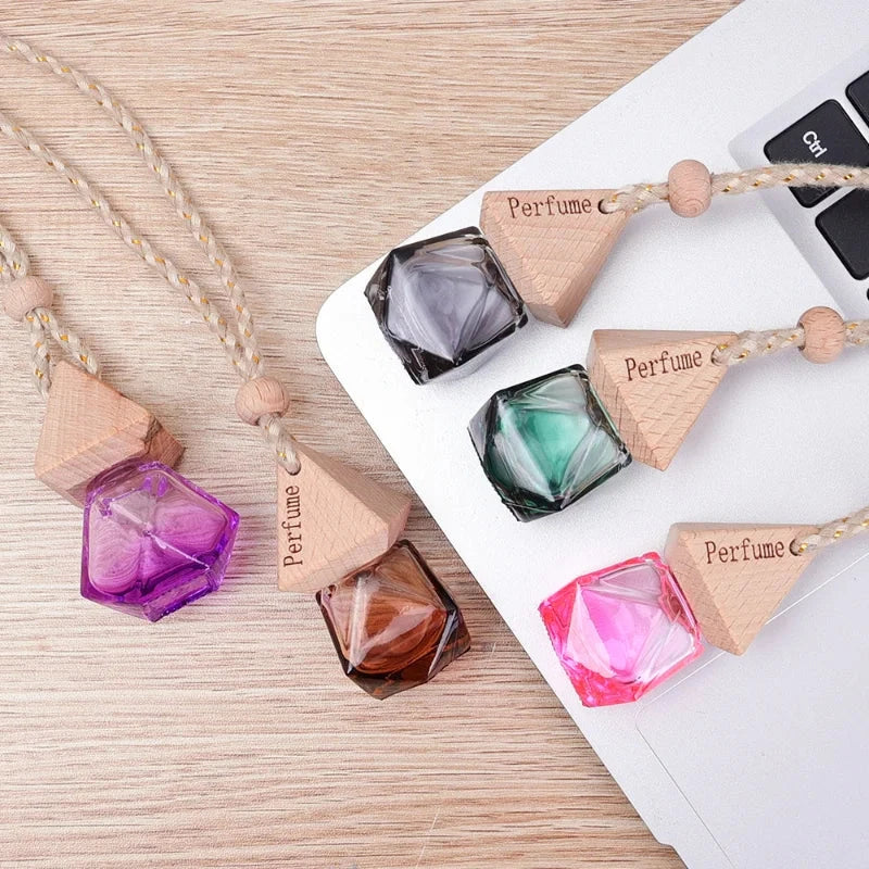 Essential Oil Diffuser Car Pendant - A sophisticated glass hanging perfume bottle that adds elegance and freshness to your car, home, or office