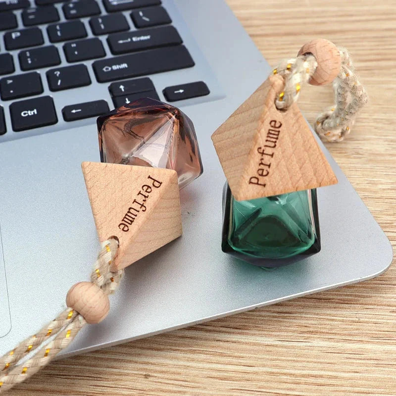 Essential Oil Diffuser Car Pendant - A sophisticated glass hanging perfume bottle that adds elegance and freshness to your car, home, or office
