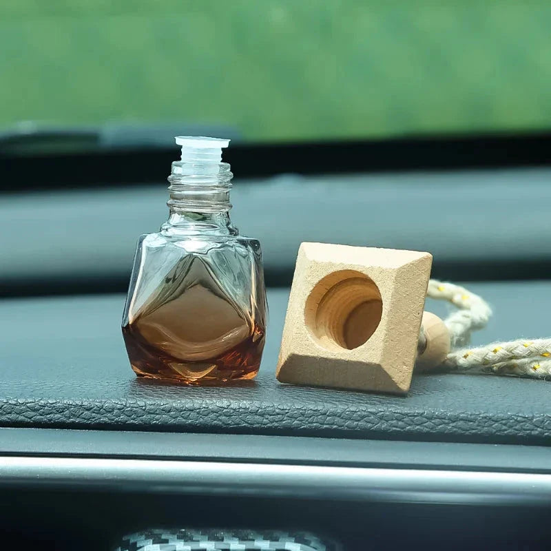 Essential Oil Diffuser Car Pendant - A sophisticated glass hanging perfume bottle that adds elegance and freshness to your car, home, or office