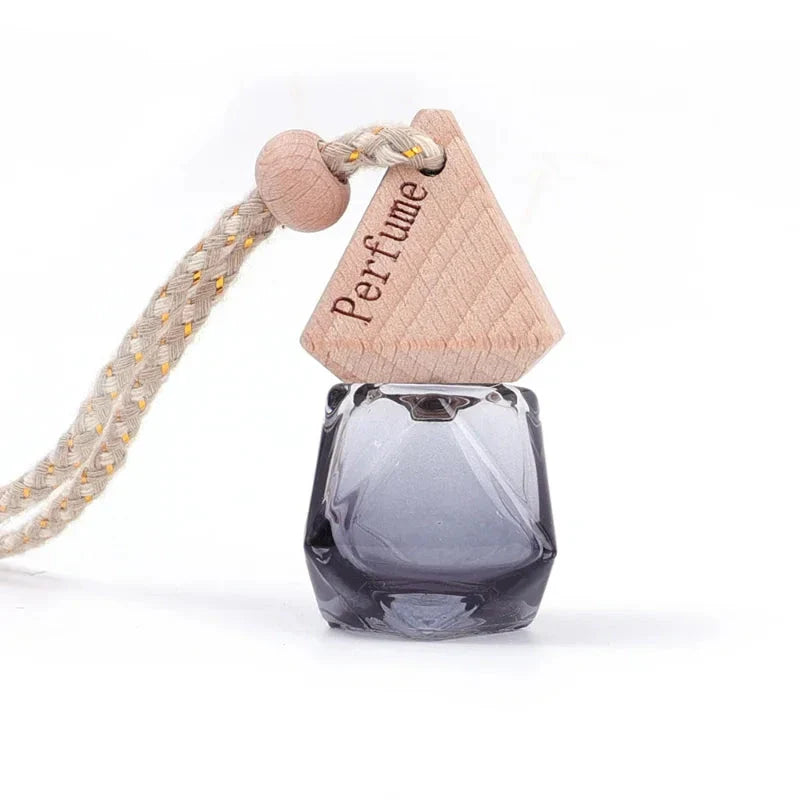 Essential Oil Diffuser Car Pendant - A sophisticated glass hanging perfume bottle that adds elegance and freshness to your car, home, or office