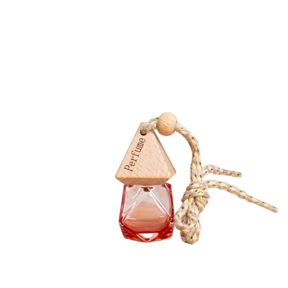 Essential Oil Diffuser Car Pendant - A sophisticated glass hanging perfume bottle that adds elegance and freshness to your car, home, or office