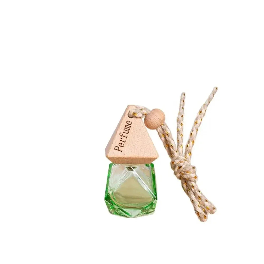 Essential Oil Diffuser Car Pendant - A sophisticated glass hanging perfume bottle that adds elegance and freshness to your car, home, or office