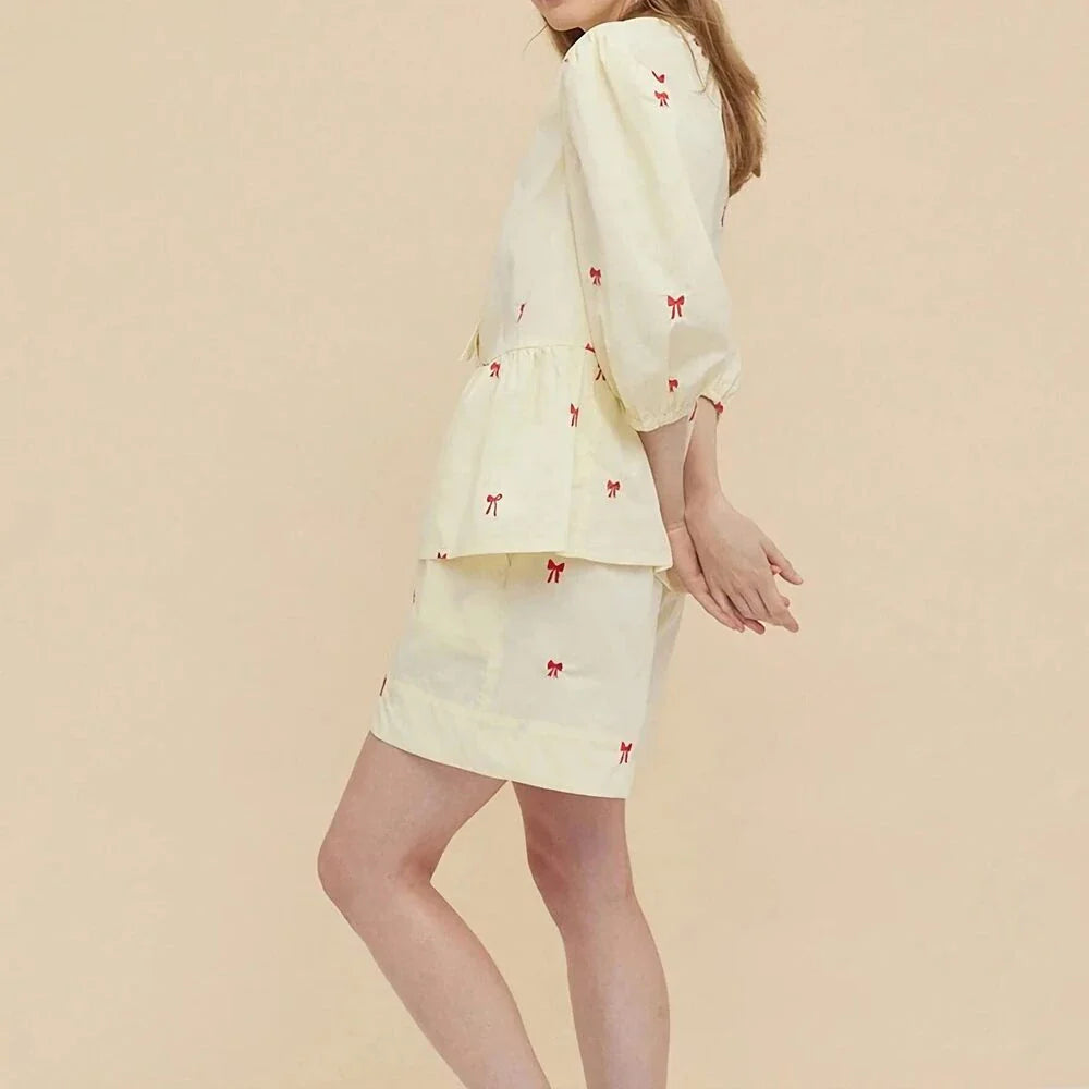 A stylish Bow Embroidery Shorts Set in breathable fabric, perfect for summer outings and events.