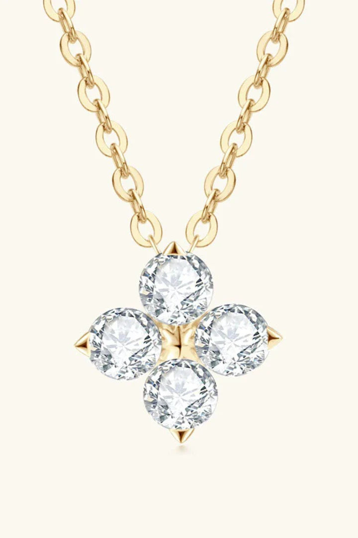 Moissanite four-leaf clover pendant necklace in sterling silver, a modern and elegant accessory with a touch of luck and charm.