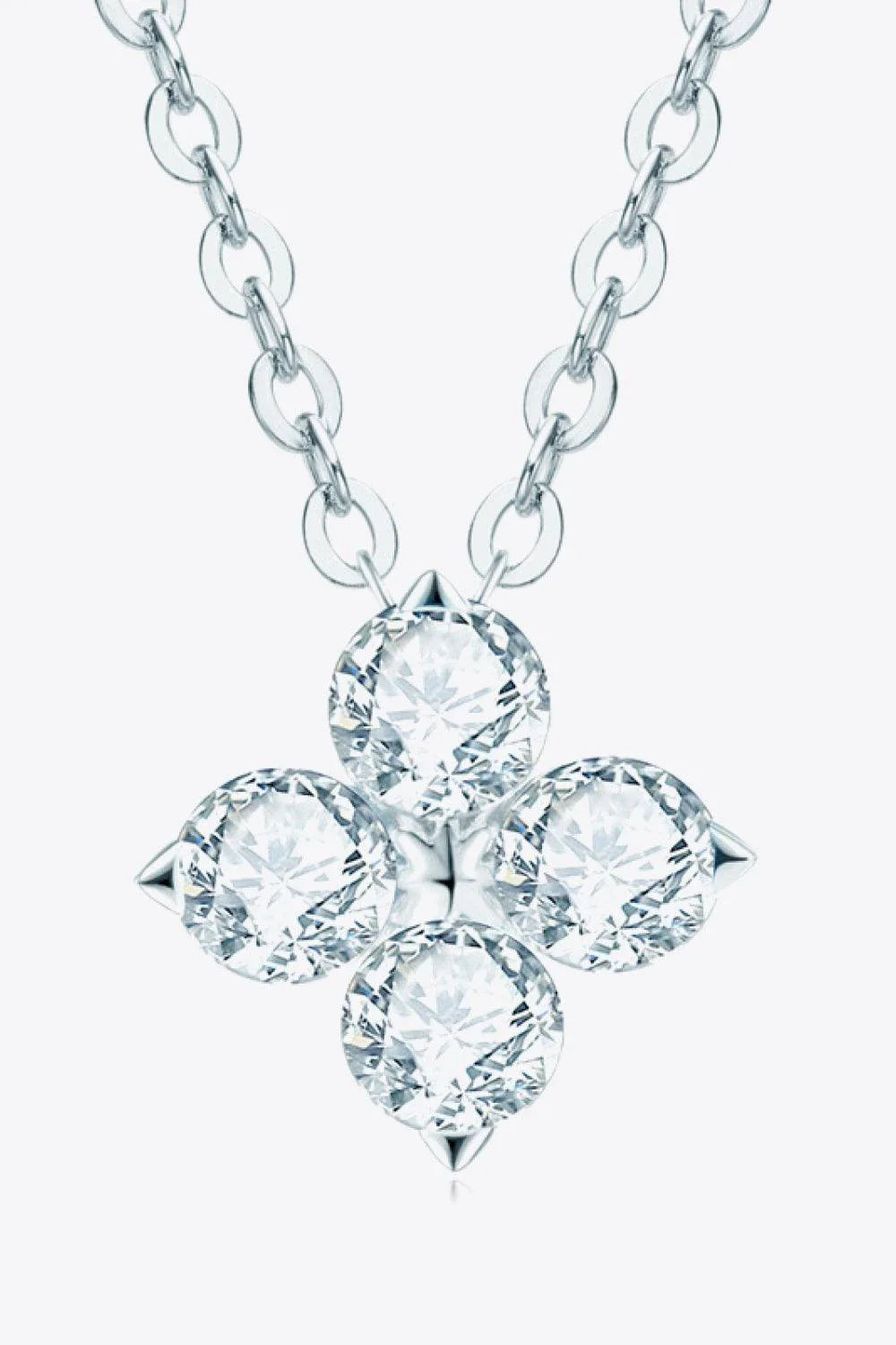 Moissanite four-leaf clover pendant necklace in sterling silver, a modern and elegant accessory with a touch of luck and charm.