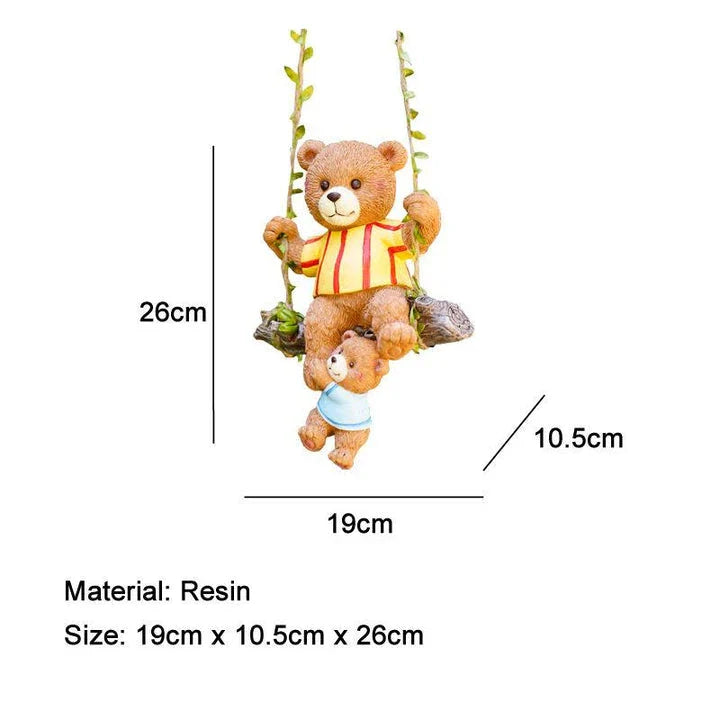Charming resin ornament depicting a mother bear and her child on a swing, adding a touch of whimsy and warmth to any decor