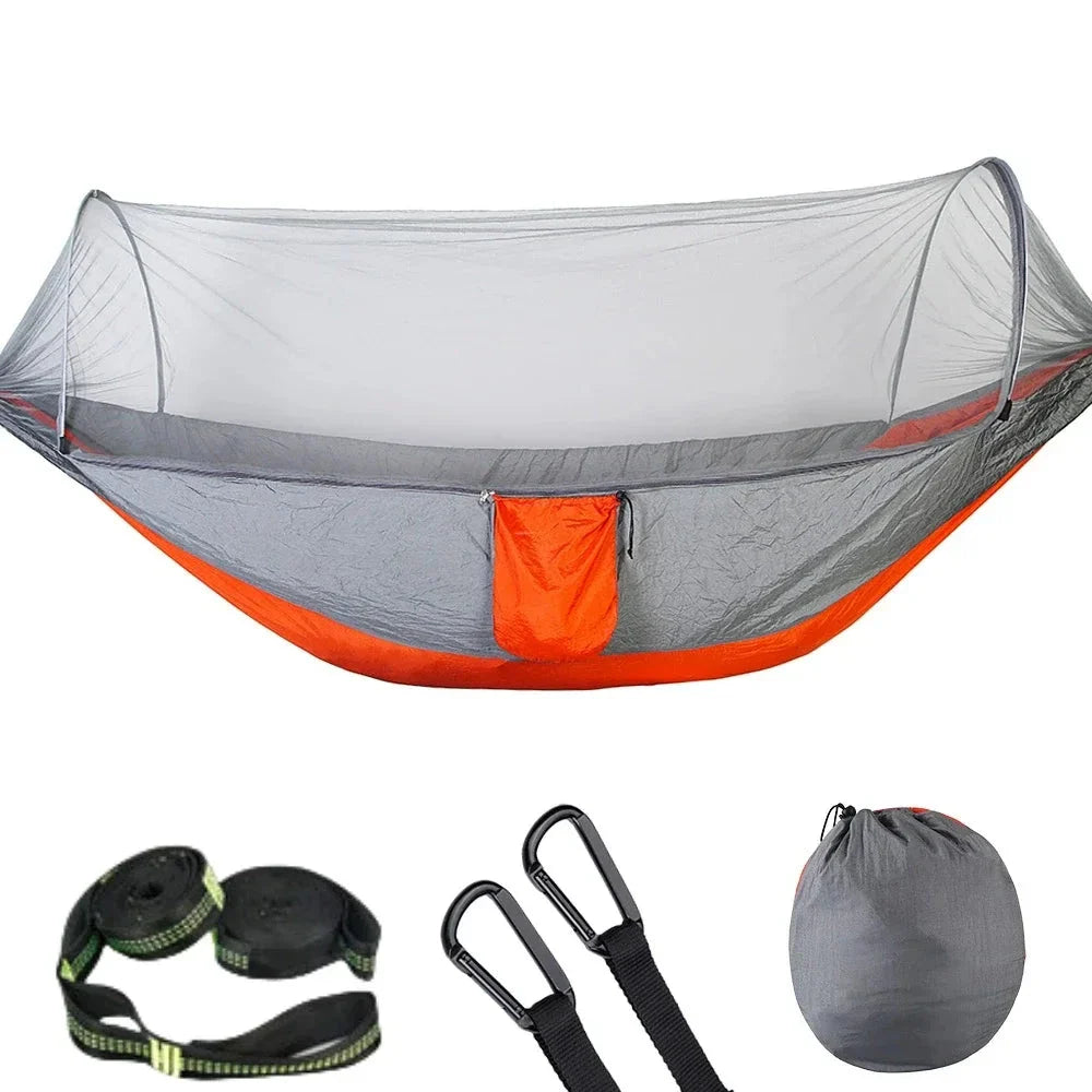 Premium portable camping hammock with integrated mosquito net in green, blue, and grey colours