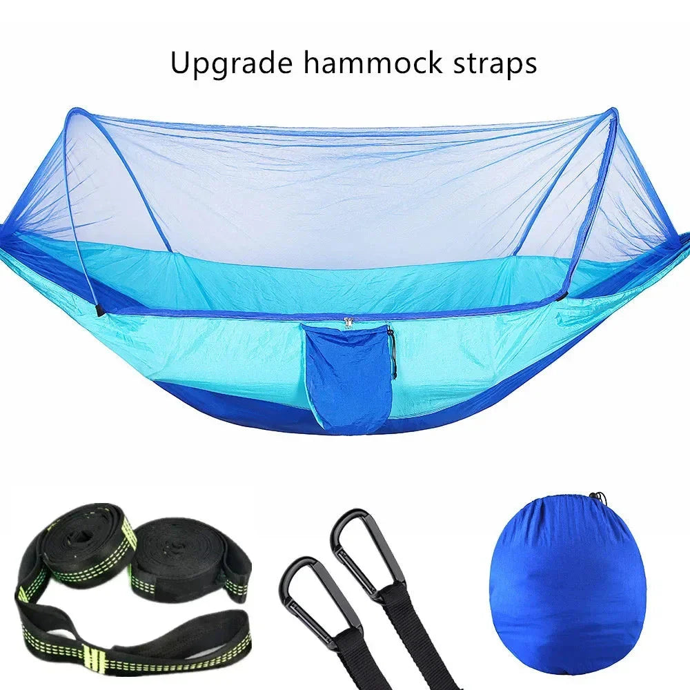 Premium portable camping hammock with integrated mosquito net in green, blue, and grey colours