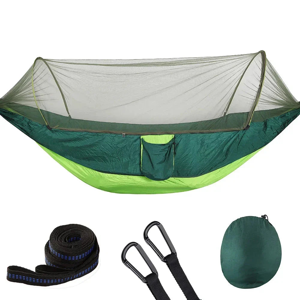 Premium portable camping hammock with integrated mosquito net in green, blue, and grey colours