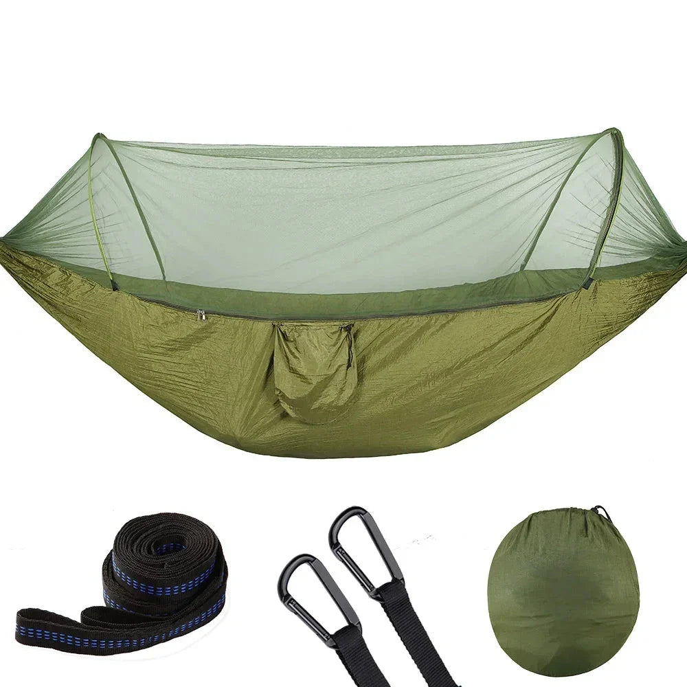 Premium portable camping hammock with integrated mosquito net in green, blue, and grey colours