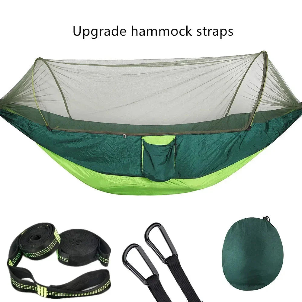 Premium portable camping hammock with integrated mosquito net in green, blue, and grey colours