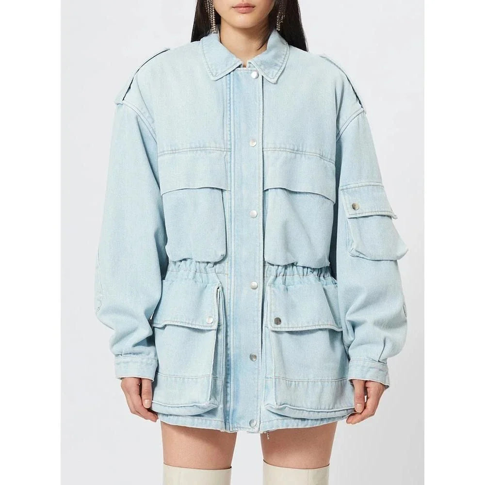 Chic patchwork denim jacket with practical pockets and button details, perfect for casual and semi-formal occasions.
