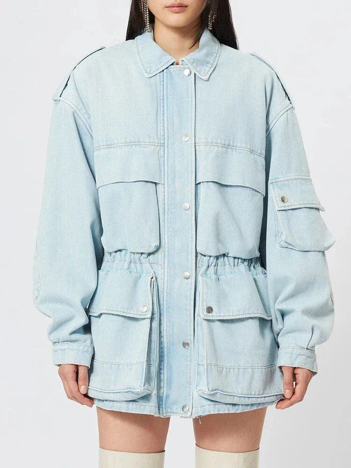 Chic patchwork denim jacket with practical pockets and button details, perfect for casual and semi-formal occasions.