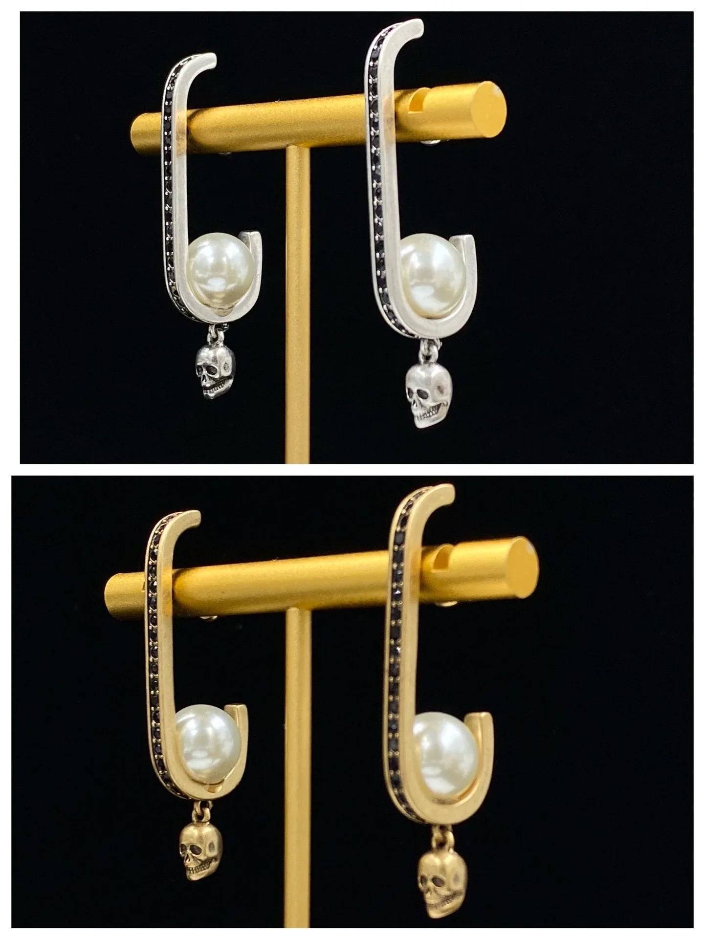 Pair of gold-tone earrings with a skull-shaped design, featuring pearls and diamonds