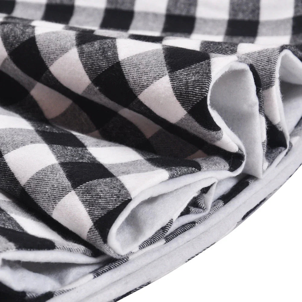 Black and white plaid Christmas tree skirt with a classic, elegant design