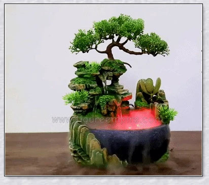 A beautiful resin tabletop fountain with flowing water, mimicking a river down a mountainside.