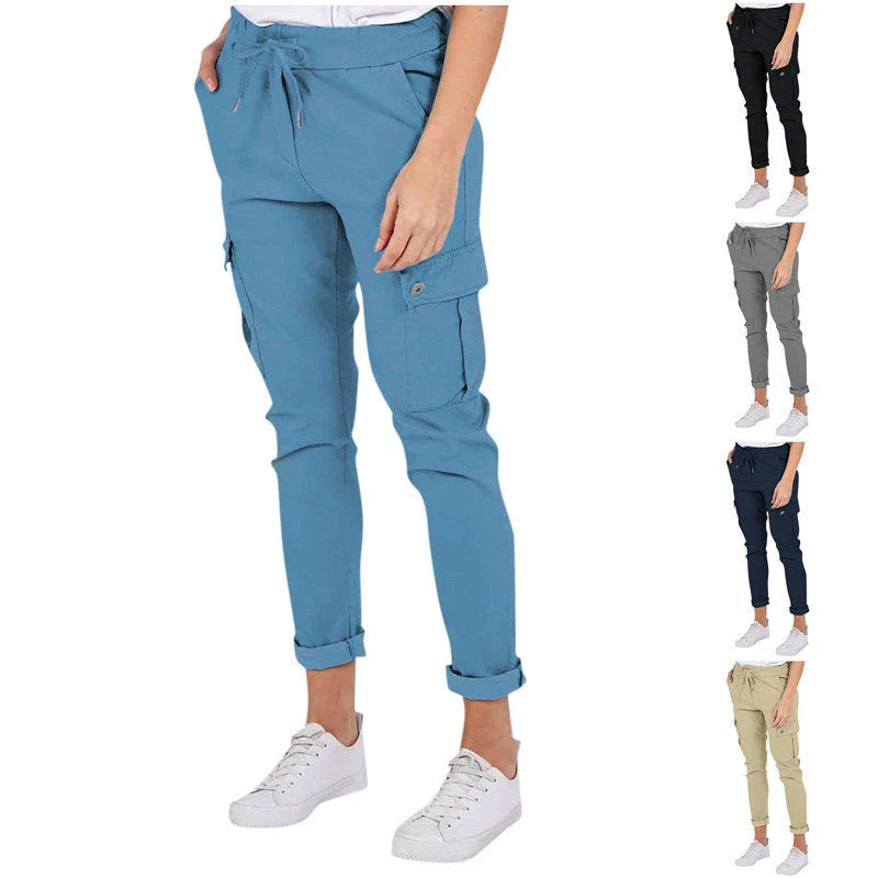 Women wearing casual cargo trousers with pockets in a solid colour and drawstring waist