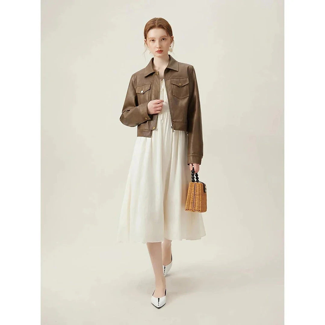Elegant Chinese-inspired dress with a romantic, sophisticated design in creamy-white colour