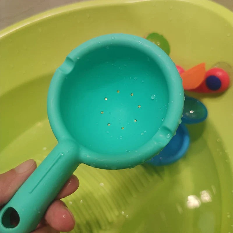 Colourful children's water wheel bath toy with spinning rainbow-coloured waterwheels