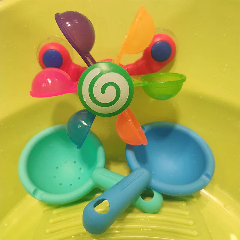 Colourful children's water wheel bath toy with spinning rainbow-coloured waterwheels