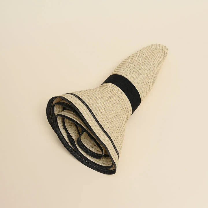 A stylish bowknot straw sun hat providing excellent UV protection and comfort for summer adventures