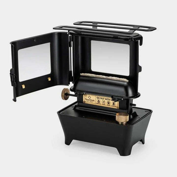 Portable retro oil lamp stove with a warm, flickering light for outdoor camping and picnics