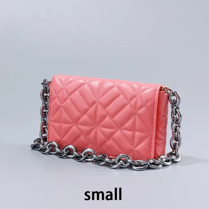 Lingge Small Bag in pink with a large gold chain, a stylish one-shoulder crossbody bag with a quilted design.
