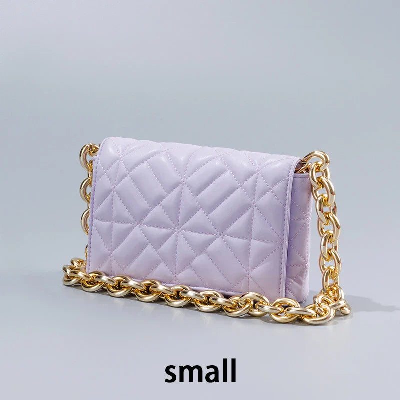 Lingge Small Bag in pink with a large gold chain, a stylish one-shoulder crossbody bag with a quilted design.