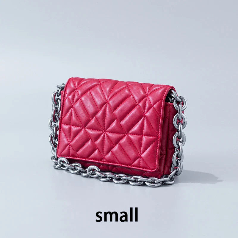 Lingge Small Bag in pink with a large gold chain, a stylish one-shoulder crossbody bag with a quilted design.