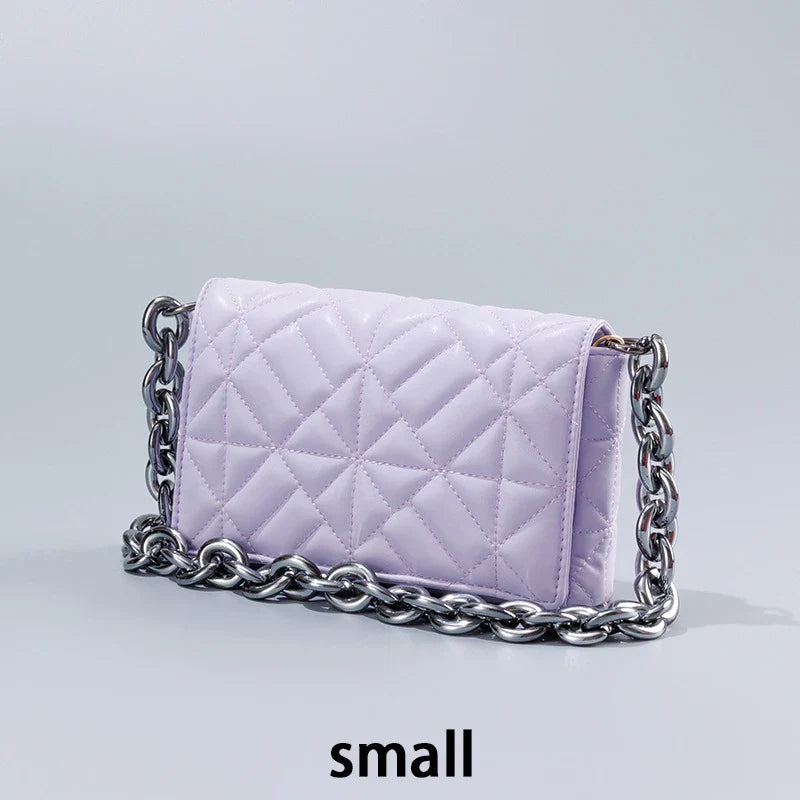Lingge Small Bag in pink with a large gold chain, a stylish one-shoulder crossbody bag with a quilted design.