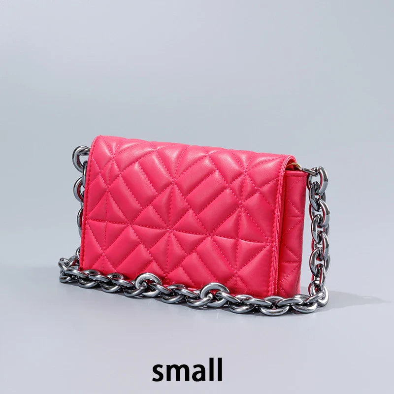 Lingge Small Bag in pink with a large gold chain, a stylish one-shoulder crossbody bag with a quilted design.
