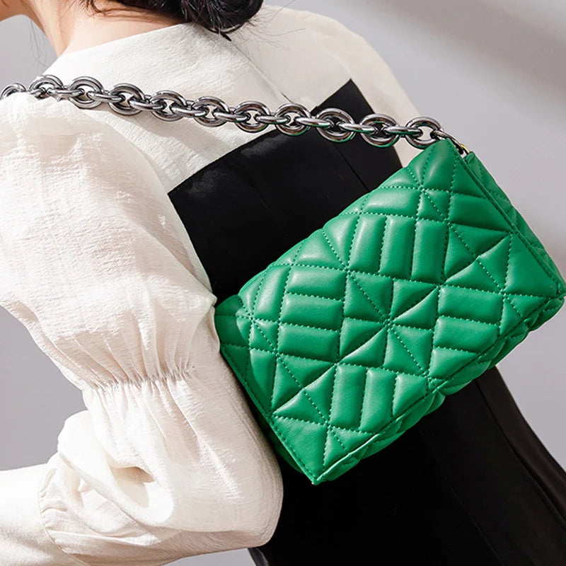 Lingge Small Bag in pink with a large gold chain, a stylish one-shoulder crossbody bag with a quilted design.