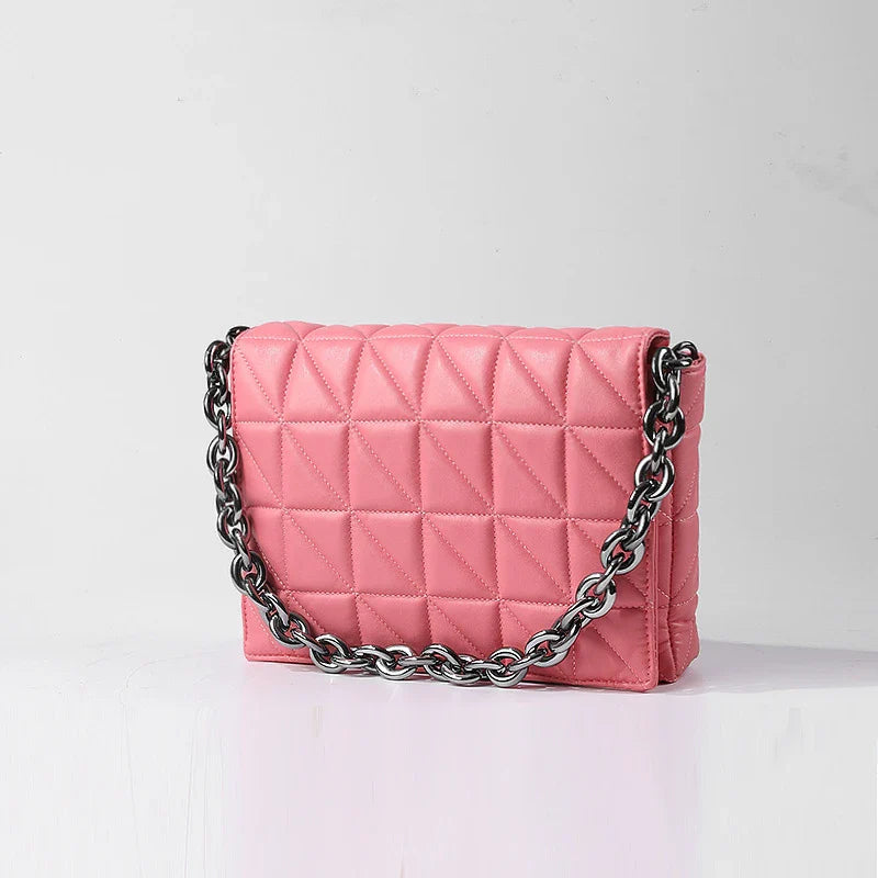 Lingge Small Bag in pink with a large gold chain, a stylish one-shoulder crossbody bag with a quilted design.