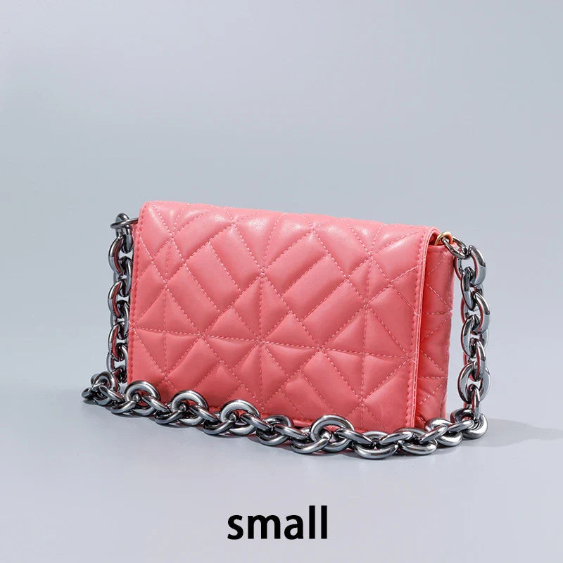 Lingge Small Bag in pink with a large gold chain, a stylish one-shoulder crossbody bag with a quilted design.