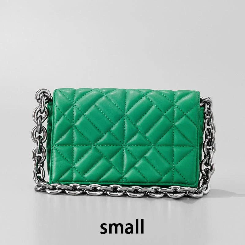 Lingge Small Bag in pink with a large gold chain, a stylish one-shoulder crossbody bag with a quilted design.