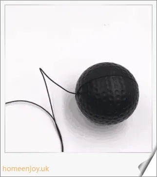 A high-quality boxing reflex speed punch ball with a sturdy steel frame and synthetic leather construction, designed for a challenging and addictive full-body workout.