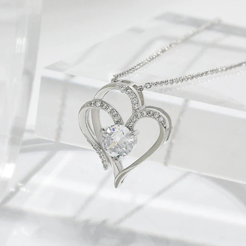 Heart-shaped pendant necklace with sparkling rhinestones, a stylish and elegant accessory for women