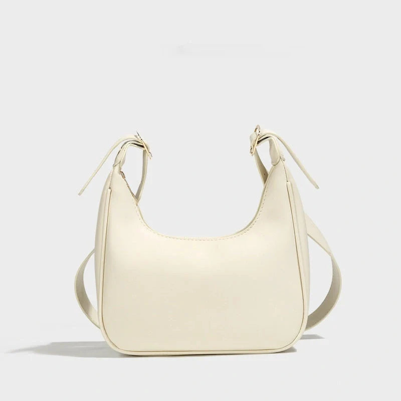 Stylish women's crossbody dumpling bag in soft PU with a crescent shape