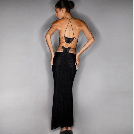 A stylish halter dress with a floral print and butterfly-inspired back, perfect for summer events and parties.