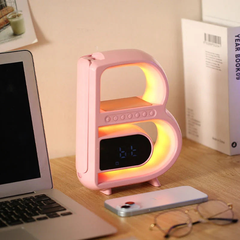 Multifunctional B-shaped Bluetooth speaker lamp with wireless charging, adjustable lighting, and alarm clock features